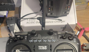 Dronas fpv, pultas tx16, bateriju kroviklis