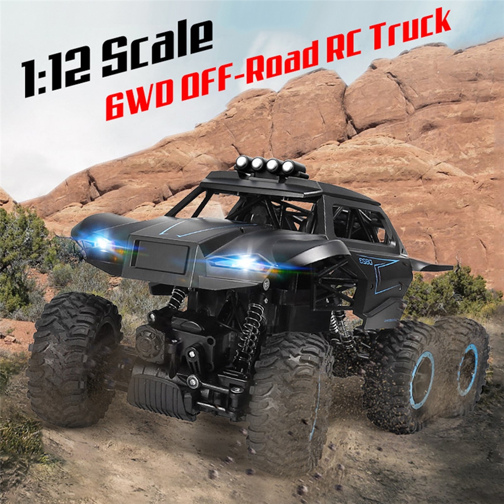 12% OFF for JJRC D823 1/12 2.4G 6WD Rc Car Off-road Climbing Truck Crawler with HeadLight RTR Toys